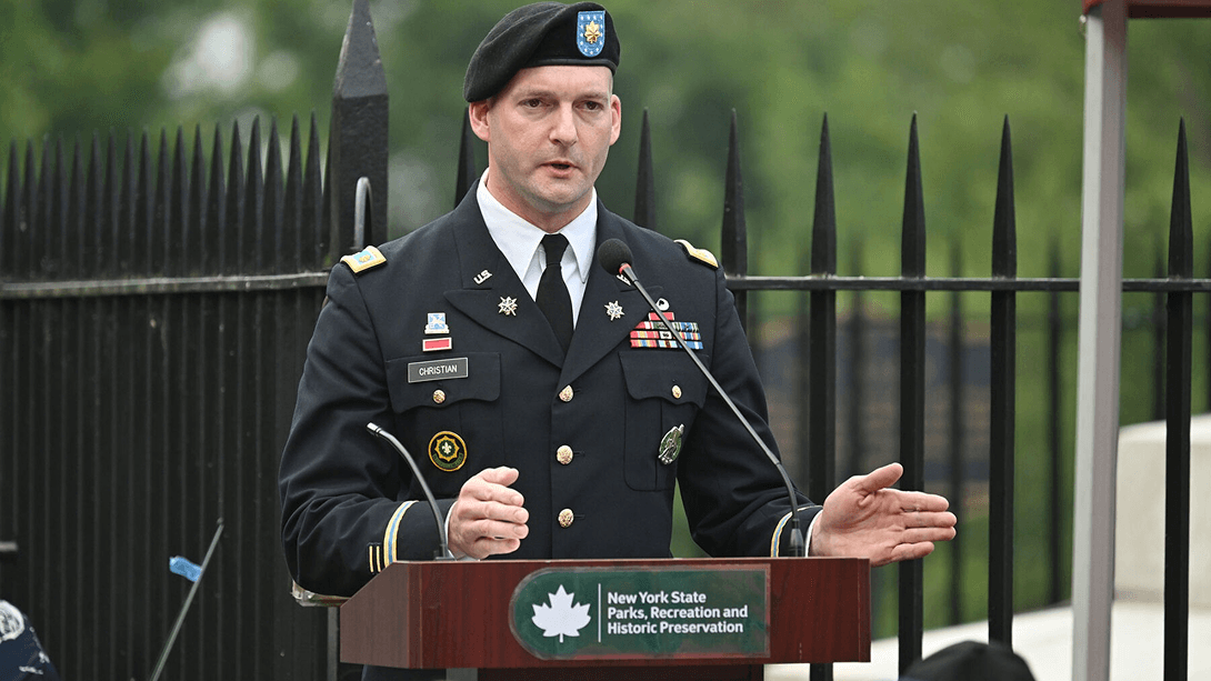 Army Captain at podium